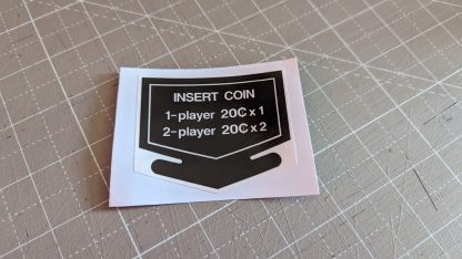nintendo insert coin 20 cents white text australia
