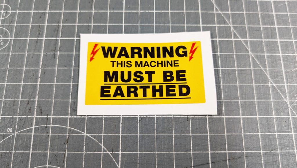 Warning label sticker this machine must be earthed Electrocoin etc ...