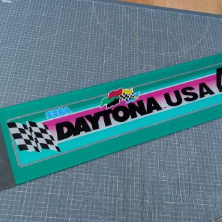 An original Sega Daytona USA Deluxe acrylic/plexi marquee. Car Number 4. Size: 108.8cm x 19.7cm Has marks and scratches from use, please examine photos for detail.