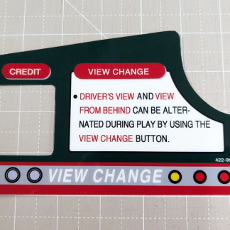 A reproduction dash instructions decal for Sega Rally 2 arcade cabinets. Part # 422-0673-01 Direct reverse printed to 0.375mm gloss polycarbonate with a 3m adhesive backing, then CNC cut to shape.